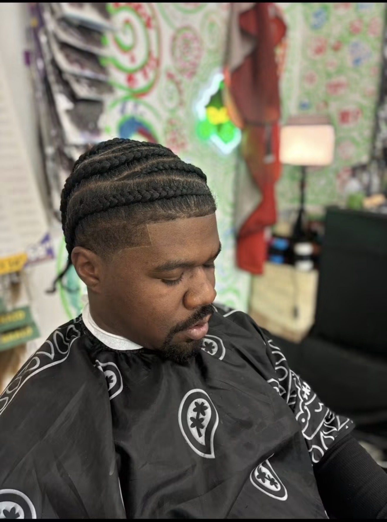 Cornrow braids with a crisp taper and line-up